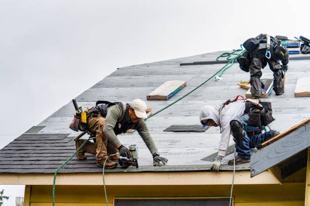 Professional Gutter Installation technician working in Round Lake, NY
